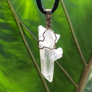 Unique quartz crystal sterling silver wrapped